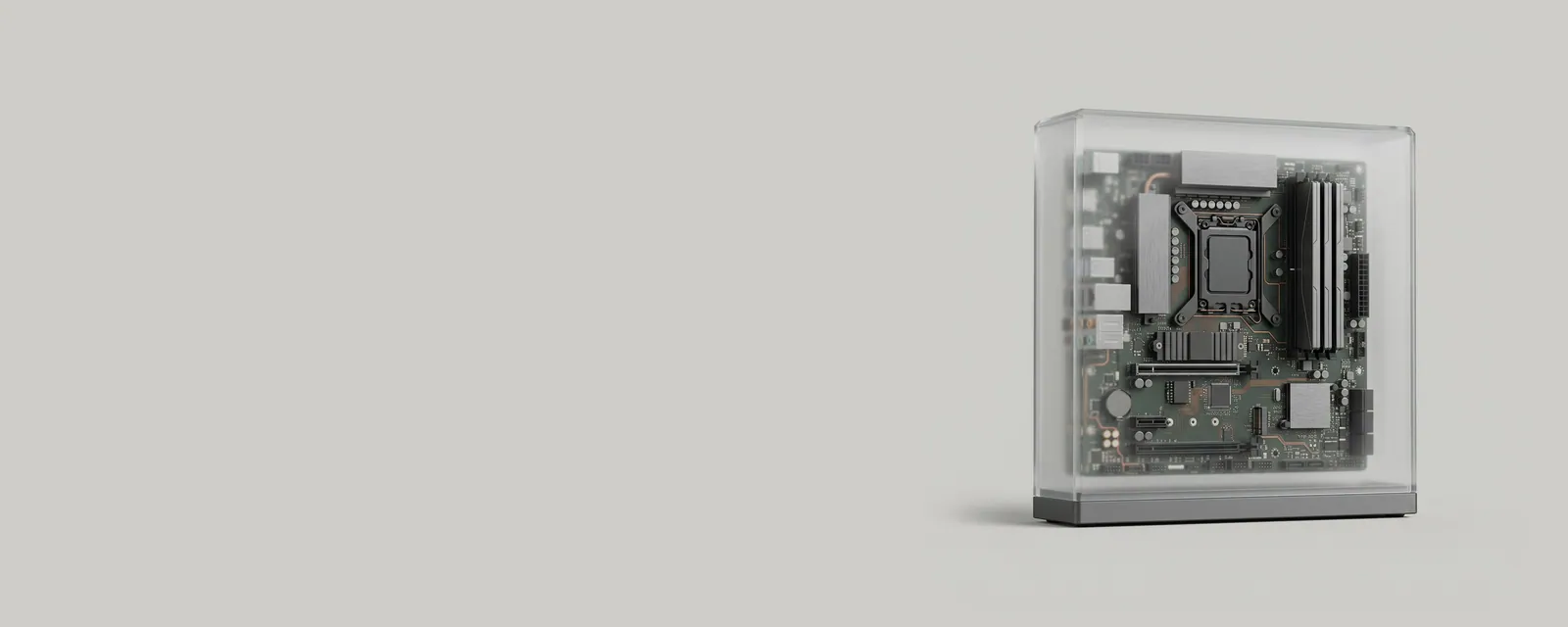 Studio render of a large frosted glass enclosure sheltering small application blocks, memory modules and a processor package