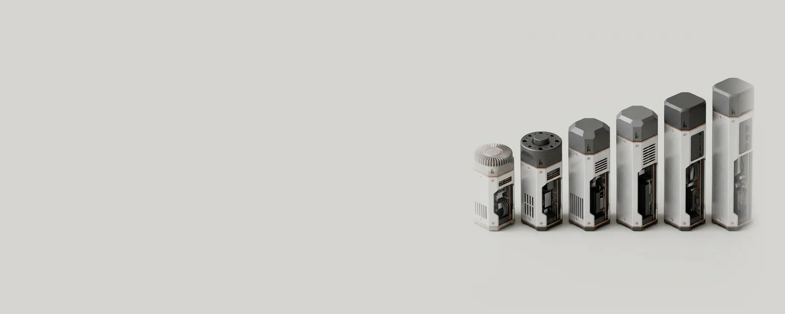 Studio render of a row of machined aluminium canisters of increasing height, each with a differently anodised cap