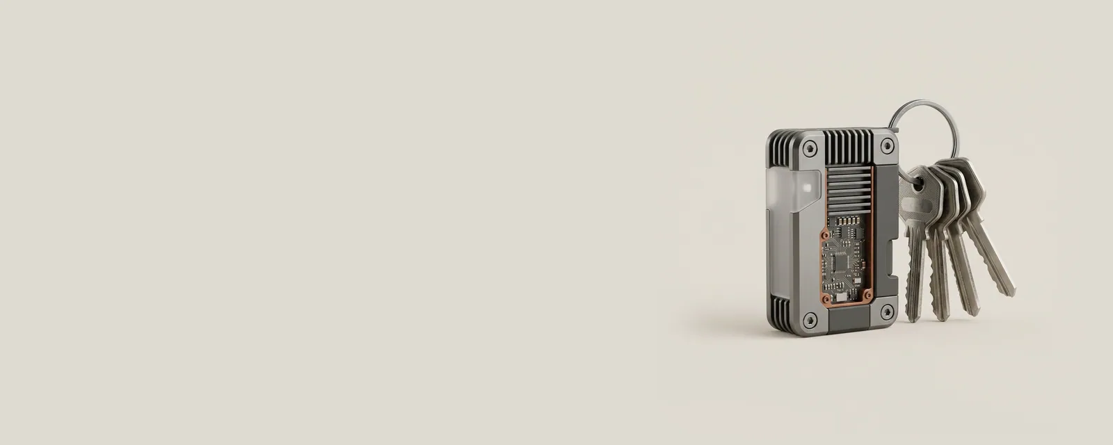 Studio render of a ring of steel keys graded from finely cut to plain broad, hanging beside a small device