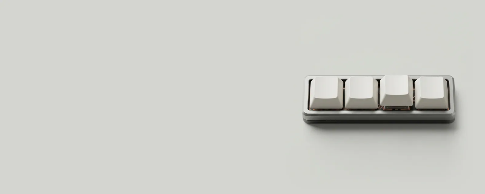 Studio render of a macro close-up of a row of laptop function keys with blank caps, one key pressed slightly lower than its neighbours