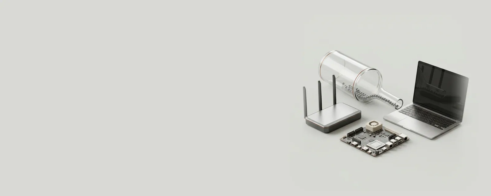 Studio render of a wide glass pipe narrowing into a smaller pipe with steel beads flowing through, between a router and a laptop