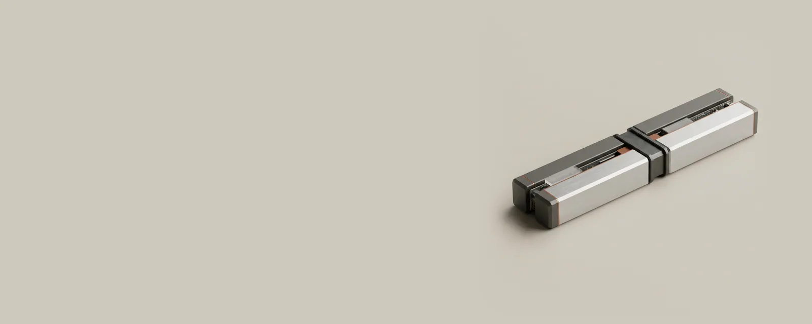 Studio render of a long machined aluminium bar divided into three anodised segments, two joined by a steel bridge into one volume